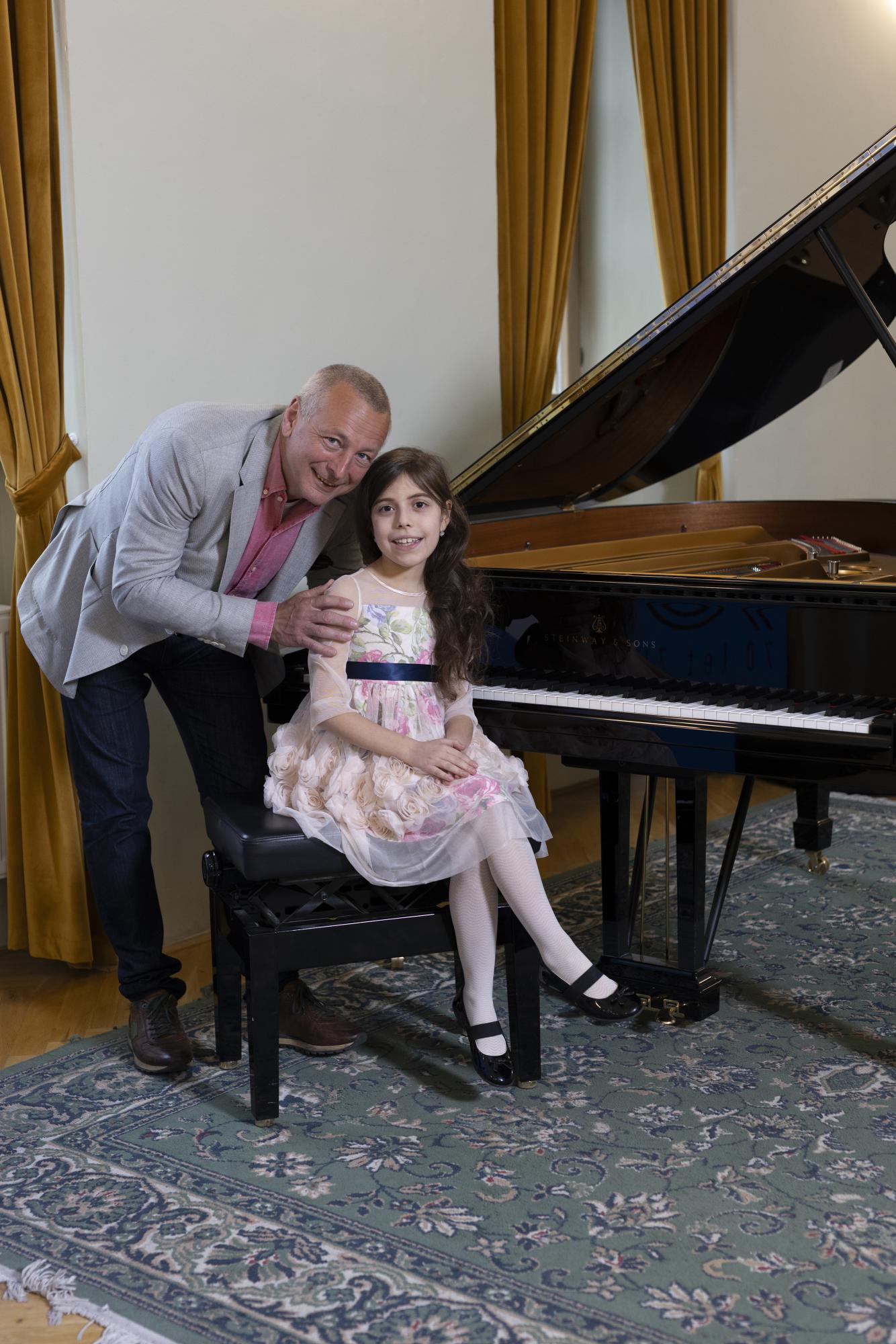 Valentina Vozňuk s pedagogem M. Rezkem